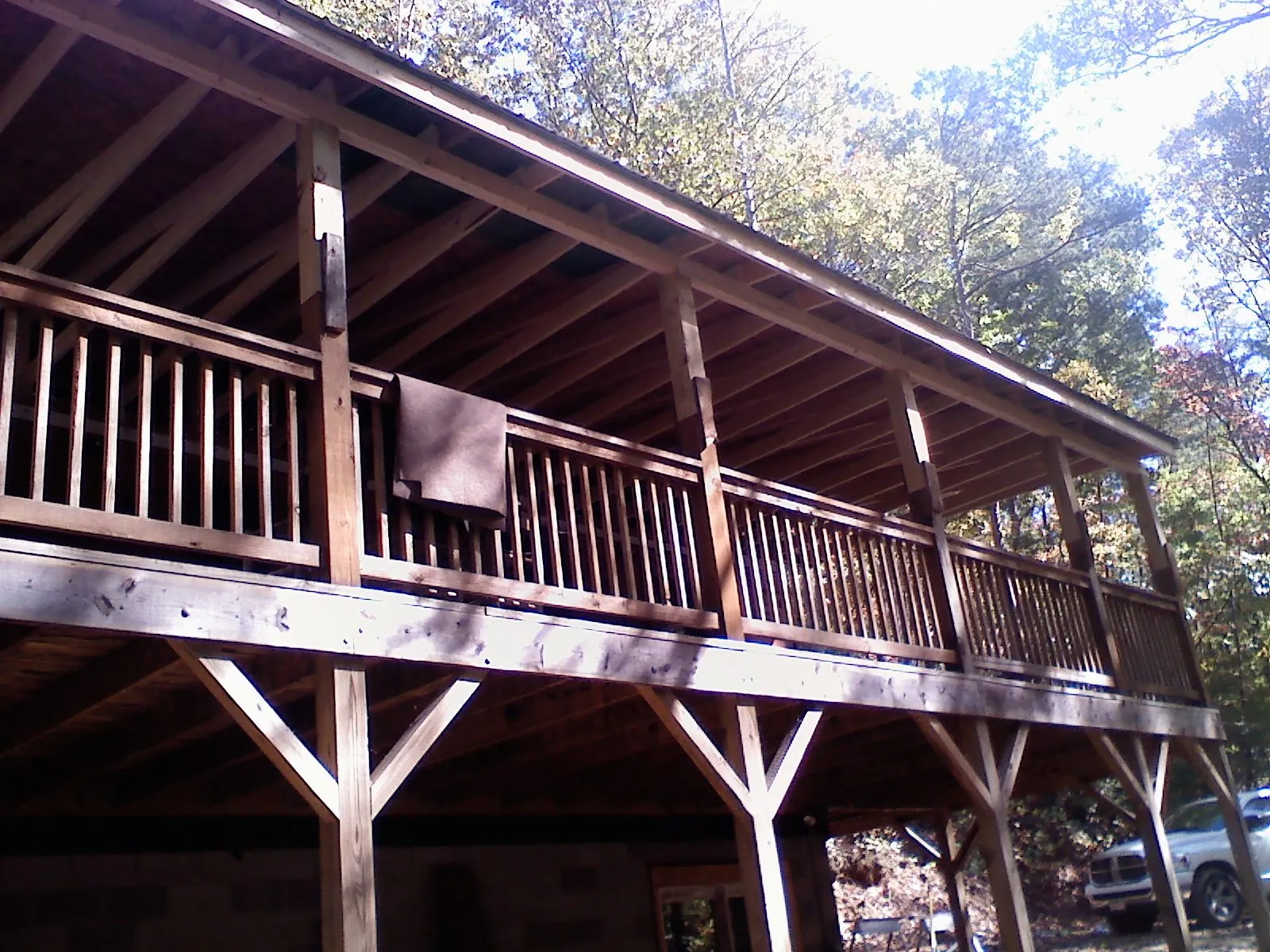 Timber framing under a new elevated porch and deck — Roof Leak Repair in Costa Mesa by Roofing Brothers